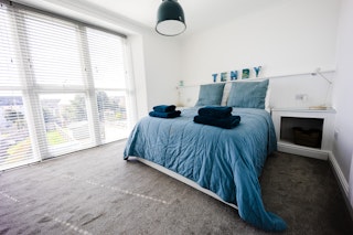 master bedroom king bed and side table